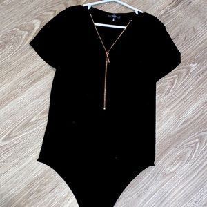 a bodysuit in a medium in woman’s